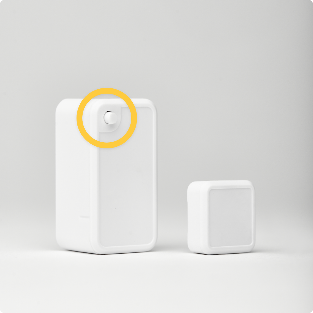 Tamper detection button on the top left corner of the door sensor