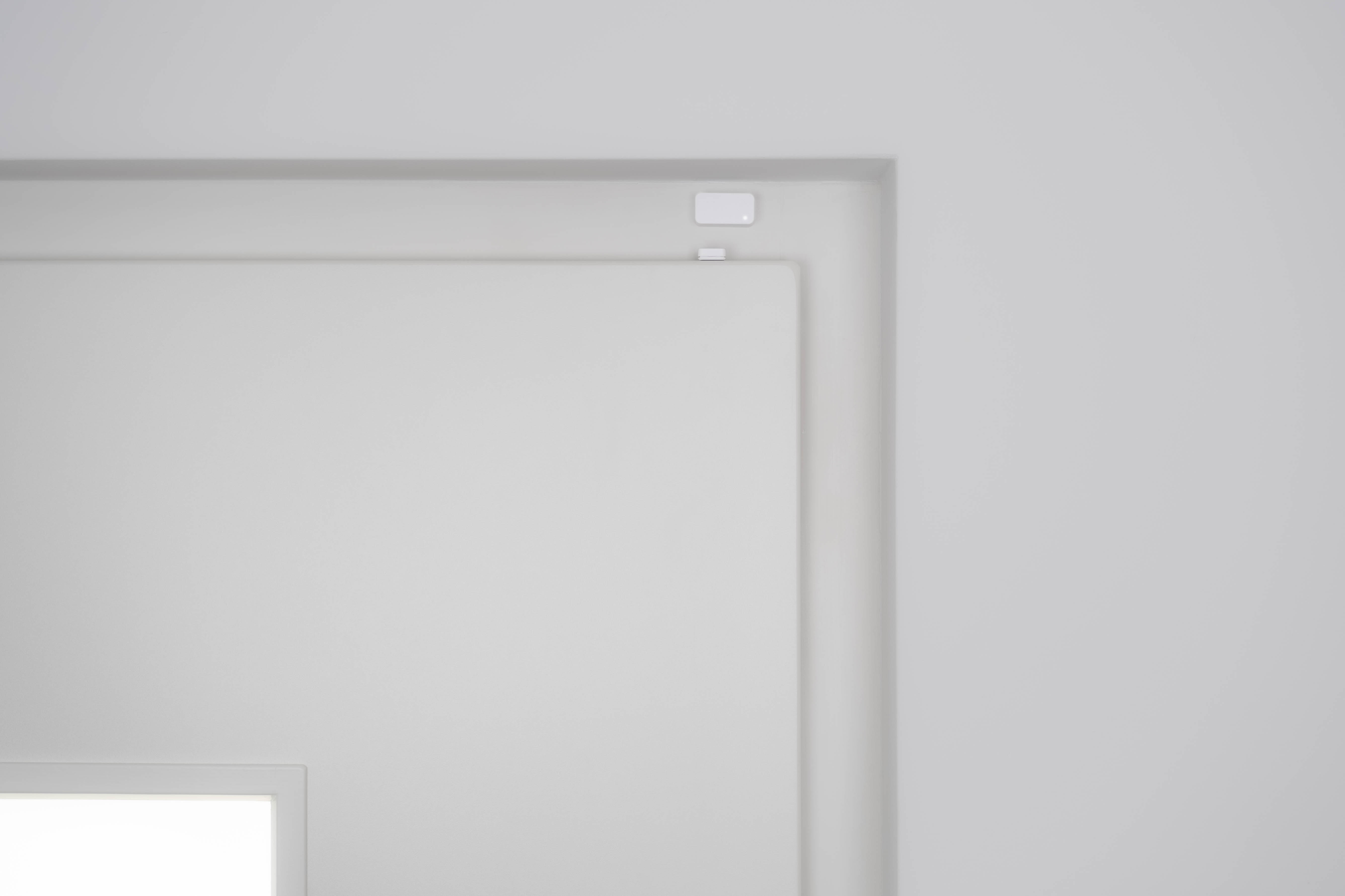 Door Sensor Mounting Example B2: If the door and the frame are not at the same level, the Door Sensor can be applied on the door and the Magnet on the edge of the door (for example at the top of the door)