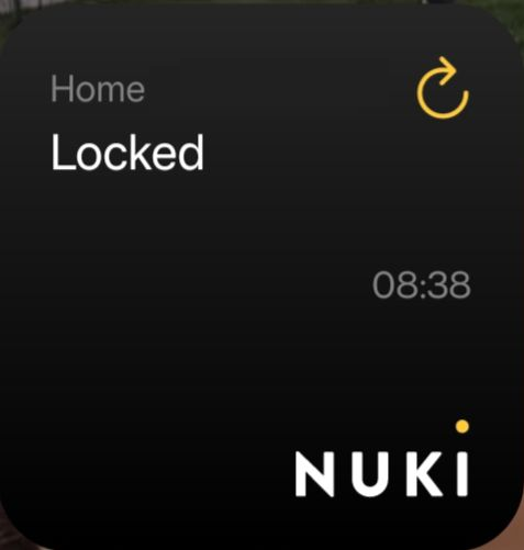 The Android Widget shows the status unlocked of the Smart Lock called Home.
