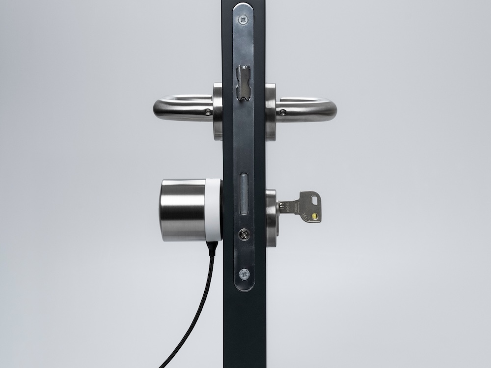 Charging Smart Lock Ultra on the door.jpg
