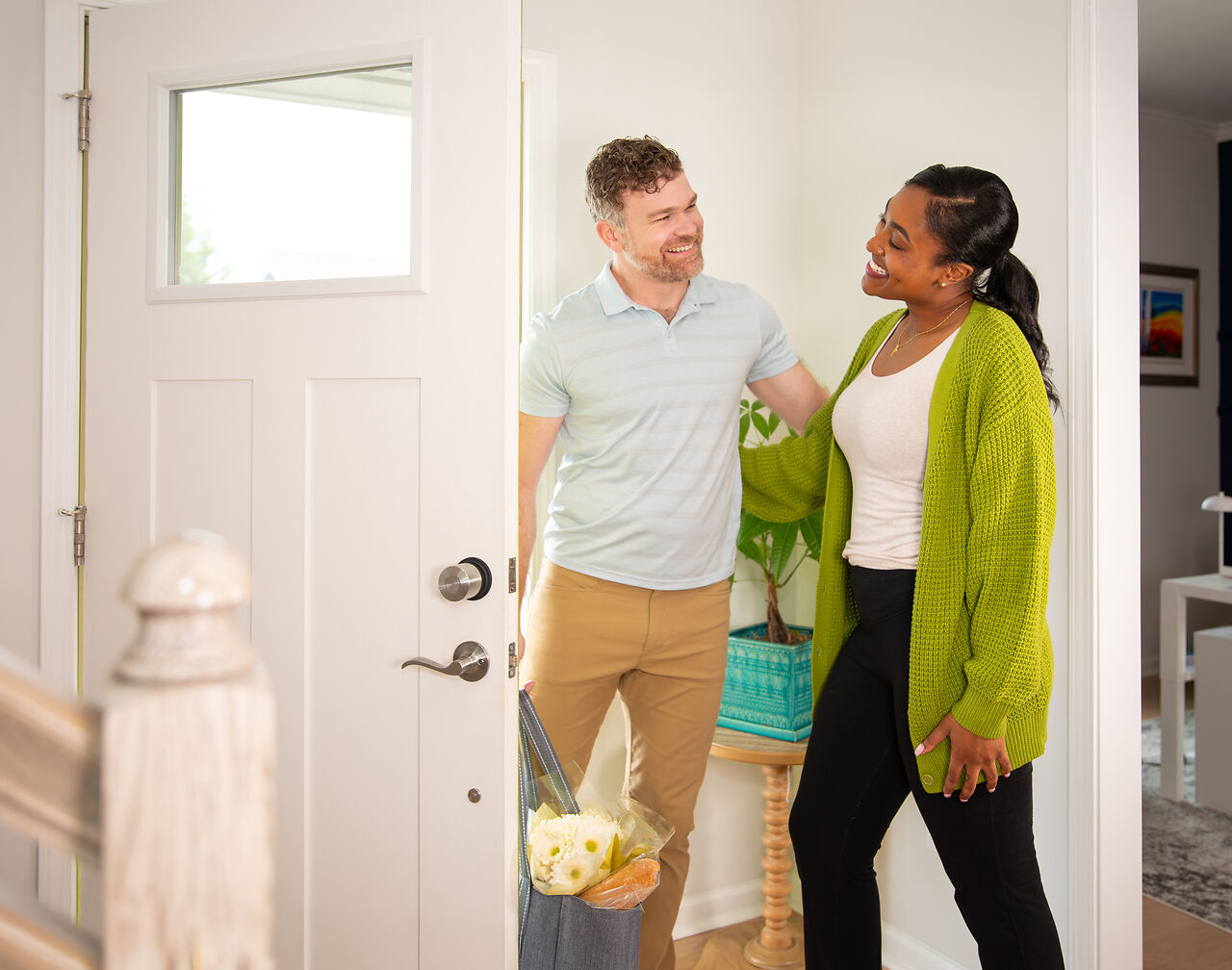 Couple entering their house with a Nuki Smart Lock US